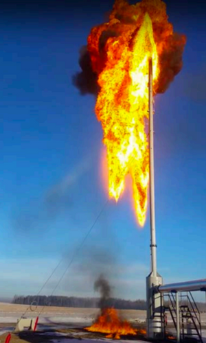 Flare carryover igniting liquids which are falling back to ground.