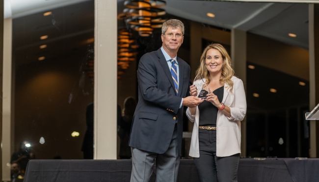 Roxy receiving award